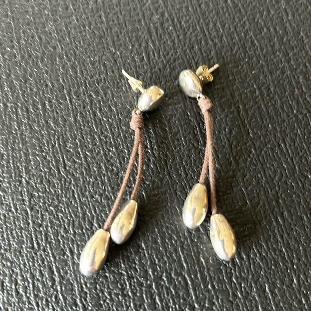 Earrings with silver studs and leather dangles